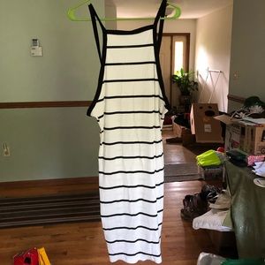 Open back spaghetti strap dress. Never worn.